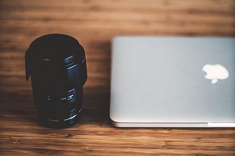 laptop computer, Camera lens, technology, camera, computer, table, wood - Material, no People, equipment, laptop, desk, indoors, close-up, ink, still life, communication, wireless technology, container, focus on foreground, high angle view, connection, black color, bottle, writing instrument, two objects, ink well, pen, 4K