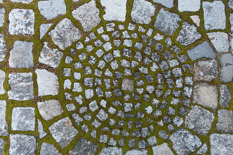 gray, concrete, surface, closed-up photo, granite, patch, moss, bemoost, ground, cobblestones, away, texture, stone, sidewalk, paving stone, green, grey, natural stone, pattern, full frame, backgrounds, no people, design, day, textured, geometric shape, shape, footpath, directly above, cobblestone, high angle view, art and craft, street, creativity, close-up, outdoors, hexagon, repetition, floral pattern, 5K, CC0, public domain, royalty free