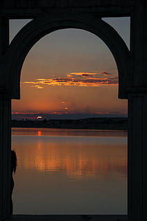 sunset, lake, clouds, reflection, beauty, idyllic, relaxing, gate, travel, water, sky, orange color, cloud - sky, scenics - nature, arch, architecture, beauty in nature, nature, built structure, no people, tranquility, tranquil scene, sea, waterfront, 5K, CC0, public domain, royalty free