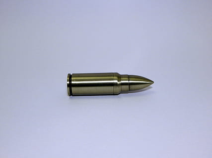 brass ammunition, bullet, ammo, ammunition, shell, brass, lead, copper, round, bronze, single Object, pen, copy space, studio shot, indoors, white background, close-up, metal, still life, no people, high angle view, communication, table, cut out, connection, sharp, two objects, gold colored, writing instrument, silver colored, 4K, CC0, public domain, royalty free