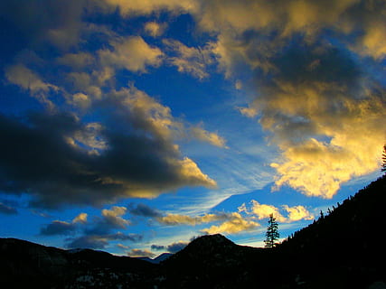 mountains, sunset, sky, clouds, outdoors, scenic, tranquil, stratosphere, atmosphere, high, weather, meteorology, cloudscape, view, environment, nature, cloud - sky, mountain, scenics - nature, beauty in nature, tranquil scene, tranquility, silhouette, no people, non-urban scene, mountain range, landscape, idyllic, tree, plant, dusk, mountain peak, 1080P, CC0, public domain, royalty free