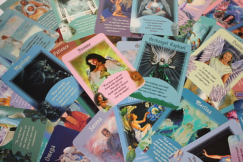 bunch, tarot cards, craft, tarot, divination, esoteric, guidance, angel cards, forecast, human representation, representation, text, male likeness, communication, no people, female likeness, indoors, still life, full frame, table, non-western script, high angle view, large group of objects, script, multi colored, backgrounds, western script, close-up, variation, 4K, CC0, public domain, royalty free