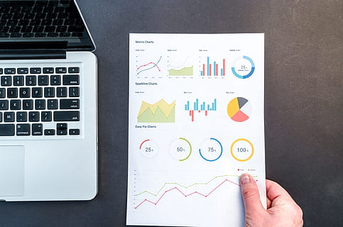 person, holding, chart, bar graph, charts, computer, data, document, facts, graph, hand, keyboard, laptop, paper, paperwork, results, survey, table, work, technology, wireless technology, human hand, communication, human body part, diagram, connection, business, number, finance, people, pie chart, planning, using laptop, analyzing, 4K, CC0, public domain, royalty free
