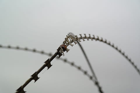 Nato, Barbed Wire, Sharp, nato wire, razor razor sharp, protection, obstacle, metal, s wire, z wiring, razor wire, military range, military zone, no people, outdoors, day, close-up, sky, fence, wire, safety, boundary, barrier, security, nature, amusement park ride, amusement park, sign, communication, iron - metal, steel, alloy, wheel, 5K, CC0, public domain, royalty free