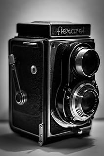 flexaret, càmera antiga, càmera, vell, pel·lícula, càmera de cinema, stredoformát, pel·lícula en blanc i negre, 120 mm, passat de moda, a l'interior, estil retro, cap gent, primer pla, càmera - equip fotogràfic, tecnologia, temes de fotografia, equip fotogràfic, natura morta, lent - instrument òptic, sol objecte, centrar-se en primer pla, tir de l'estudi, antiguitat, cultura i entreteniment artístic, música, càmera digital, taula, càmera slr, 5K, CC0, domini públic, lliure de regalies