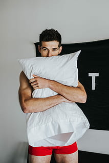 man, hugging, white, bed pillow, pillow, hug, bed, caucasian, squeeze, brunette, red, calvin klien, klein, calvin, muscle, arm, dark hair, cute, hot, atlien, atlantum, atl, young adult, one person, young men, looking at camera, front view, indoors, standing, three quarter length, portrait, confidence, clothing, real people, white color, adult, arms crossed, lifestyles, studio shot, hairstyle, shorts, 4K, CC0, public domain, royalty free