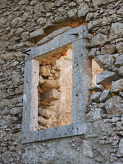 window, stone, cabo espichel, architecture, built structure, stone wall, wall, old, no people, wall - building feature, solid, the past, stone material, day, history, building exterior, textured, weathered, low angle view, stone - object, close-up, building, pattern, outdoors, brick, deterioration, ancient civilization, 2K, CC0, public domain, royalty free