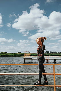 blonde, woman, wooden, pier, lake, Beautiful, wooden pier, by the lake, female, girl, water, young, wood, pretty, jetty, attractive, women, outdoors, people, females, young Adult, one Person, caucasian Ethnicity, lifestyles, adult, summer, bridge - Man Made Structure, nature, nautical vessel, river, full length, only women, sky, cloud - sky, transportation, real people, standing, casual clothing, mode of transportation, day, leisure activity, railing, 4K
