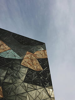 low, angle view photo, building, architecture, infrastructure, structure, establishment, glass, triangle, design, art, low angle view, modern, built structure, sky, no people, outdoors, day, building exterior, cloud - sky, nature, pattern, city, glass - material, art and craft, office building exterior, tall - high, travel destinations, 2K, CC0, public domain, royalty free
