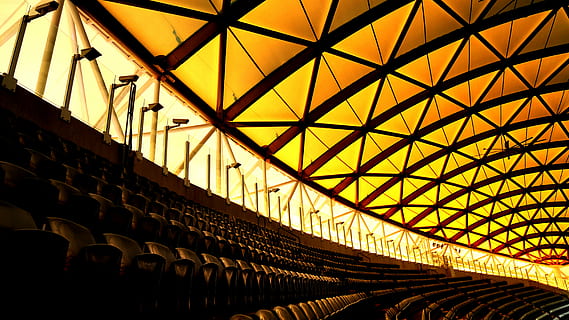 architecture, building, CCTV, column, dark, design, light, modern, row, stadium, steel, built structure, low angle view, indoors, ceiling, pattern, no people, roof, day, architectural feature, sunlight, sky, repetition, in a row, full frame, lighting equipment, geometric shape, industry, architecture and art, roof beam, 5K, CC0, public domain, royalty free