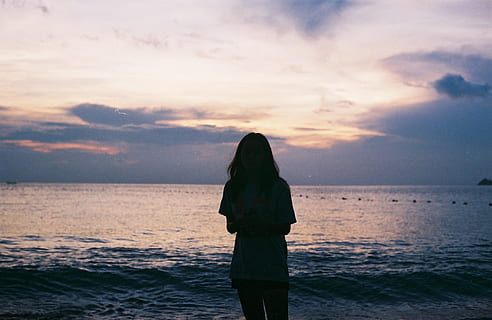 silhouette, woman, standing, large, body, water, backlit, clouds, dusk, evening, girl, landscape, nature, ocean, outdoors, person, sea, seascape, seashore, silhouettes, sky, sunset, wave, beauty in nature, horizon over water, three quarter length, real people, horizon, one person, scenics - nature, beach, leisure activity, lifestyles, land, women, cloud - sky, 1080P, CC0, public domain, royalty free
