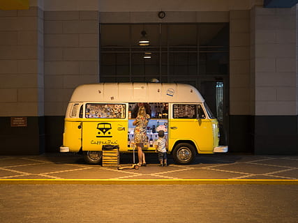 woman, boy, standing, front, opened, rv door, RV, door, bus, transportation, land Vehicle, school Bus, mode of Transport, street, travel, people, public Transportation, urban Scene, car, city, city Life, taxi, yellow, yellow taxi, mode of transportation, architecture, built structure, motor vehicle, building exterior, outdoors, stationary, day, text, building, real people, 2K, CC0, public domain, royalty free