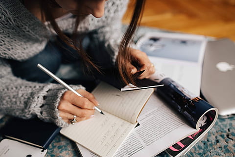 grey, sweater, taking, notes, organizer, Woman, notebook, notepad, calendar, writing, people, document, pen, women, one Person, working, human Hand, paper, holding, adult, one man only, adults only, artist, indoors, hand, close-up, sitting, human body part, table, high angle view, concentration, hair, business, paperwork, hairstyle, 5K