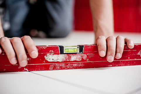 red, wooden, spirit lever, holding, person, building, glazurkarz, ceramic, tiles, terrakota, tile, tarakota, professional, spirit level, employee, builder, worker, repair, the operator, safety, business, body, man, factory, helmet, surveyor, people, the foreman, mechanics, male, tools, work, the production of, the industry, industrial, development, pro, human hand, human body part, hand, one person, close-up, occupation, indoors, working, work tool, men, day, craftsperson, craft, skill, diy, adult, art and craft, table, home improvement, finger, positioning, 4K, CC0, public domain, royalty free