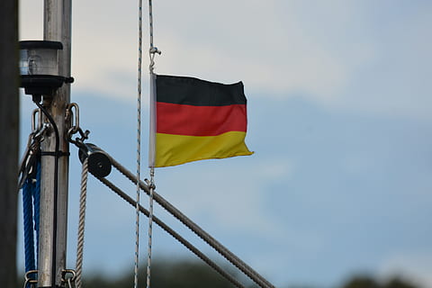 technology, ship, flag, germany, patriotism, sky, low angle view, pole, wind, environment, no people, yellow, nature, day, waving, outdoors, red, focus on foreground, pride, emotion, copy space, 5K, CC0, public domain, royalty free