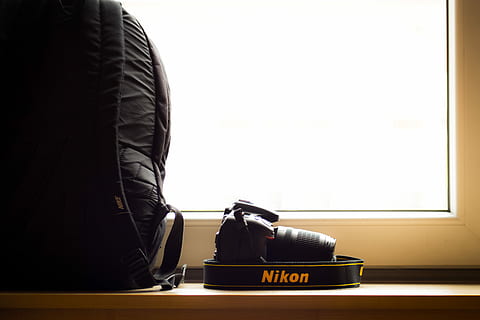 black, nikon dslr camera, beside, backpack, nikon dslr, bag, nikon, camera, window, sunlight, indoors, text, black color, day, people, shoe, close-up, clothing, copy space, still life, communication, nature, jacket, luggage, 5K, CC0, public domain, royalty free