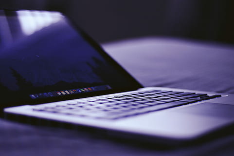 black laptop computer, close-up photo, gray, black, laptop computer, macbook, computer, screen, purple, reflection, technology, laptop, wireless technology, keyboard, selective focus, computer equipment, communication, connection, close-up, computer keyboard, indoors, no people, night, still life, table, open, business, studio shot, 4K, CC0, public domain, royalty free