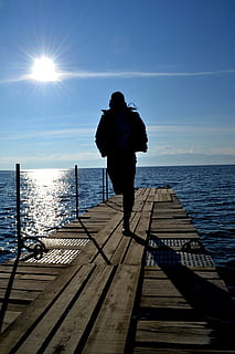 run, dock, sun, sea, water, sky, real people, full length, rear view, one person, sunlight, beauty in nature, leisure activity, lifestyles, standing, nature, horizon, horizon over water, pier, scenics - nature, men, outdoors, 4K, CC0, public domain, royalty free
