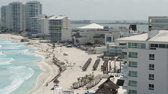 cancun, mexicà, platja, estructura construïda, arquitectura, exterior de l'edifici, ciutat, aigua, mar, edifici, vista d’angle alt, naturalesa, dia, barri residencial, terra, persones incidentals, a l'aire lliure, viatjar, destinacions de viatge, manera de transport, paisatge urbà, piscina, 1080P, CC0, domini públic, lliure de regalies