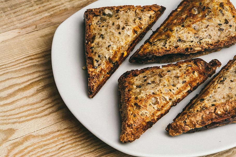 bread, toasted, food, snacks, food and drink, freshness, plate, indoors, high angle view, no people, still life, ready-to-eat, serving size, slice, directly above, table, wellbeing, close-up, toasted bread, healthy eating, wood - material, dairy product, snack, 2K