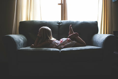 girl, lying, gray, sofa, black, house, interior, couch, living, room, kid, child, people, relax, window, curtain, relaxation, indoors, adults only, cozy, living room, comfortable, feet up, sitting, furniture, domestic room, lifestyles, one person, full length, real people, day, leisure activity, women, home interior, lying down, barefoot, 5K