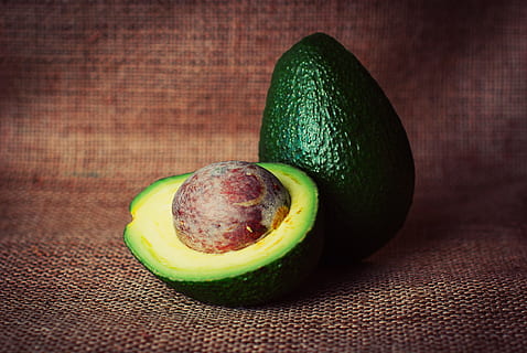 sliced, whole, green, avocados, avocado, vegetable, cut, half, pit, healthy, food, vegetarian, fresh, organic, diet, natural, raw, eating, ingredient, nutrition, vitamin, snack, vegan, ripe, tropical, cuisine, color, cooking, macro, closeup, healthy eating, food and drink, freshness, wellbeing, fruit, green color, indoors, no people, table, still life, close-up, seed, cross section, wood - material, slice, halved, focus on foreground, antioxidant, 2K, CC0, public domain, royalty free