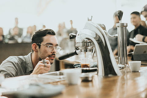 man, front, coffeemaker, coffee, maker, machine, hot, drink, brewed, espresso, table, people, guy, barista, coffeehouse, shop, men, cafe, adult, males, coffee - Drink, caucasian Ethnicity, lifestyles, technology, restaurant, coffee Shop, indoors, one Person, young Adult, headshot, business, mid adult, portrait, mid adult men, food and drink, young men, sitting, glasses, coffee cup, drinking, 2K, CC0, public domain, royalty free