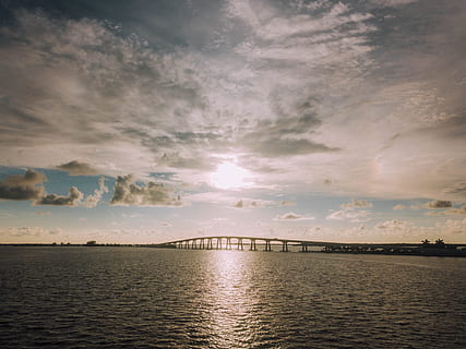 sea, dawn, nature, beach, bridge, cloud, dusk, ocean, reflection, ripples, scenery, scenic, seascape, sunlight, water, cloud - sky, sky, scenics - nature, sunset, beauty in nature, waterfront, tranquil scene, no people, tranquility, architecture, built structure, idyllic, bridge - man made structure, outdoors, 4K, CC0, public domain, royalty free