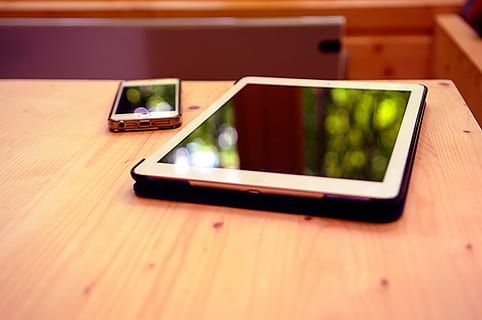 ipad, beige, table, beside, iphone, black, tablet, computer, technology, mobile, business, office, desk, objects, wireless technology, communication, digital tablet, connection, indoors, portable information device, touch screen, device screen, smart phone, screen, wood - material, mobile phone, portability, furniture, no people, internet, digital display, computer network, electronic organizer, digital viewfinder, 4K, CC0, public domain, royalty free