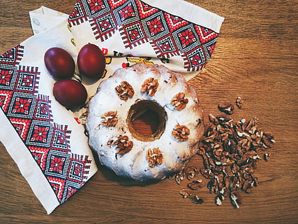 three, eggs, bread, table, easter, easter cake, nuts, holiday, kitchen, red, white, food, dessert, snack, gourmet, wood - Material, breakfast, food and drink, high angle view, still life, indoors, freshness, sweet food, no people, directly above, baked, indulgence, ready-to-eat, celebration, sweet, temptation, fruit, christmas ornament, 2K, CC0, public domain, royalty free