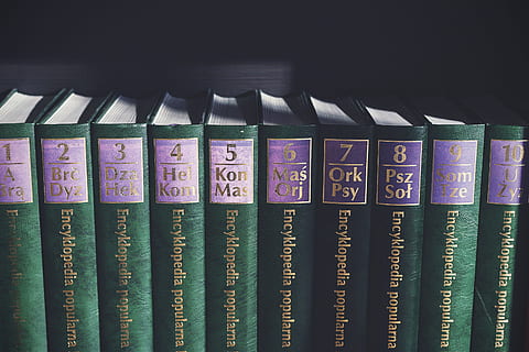 books, encyclopedia, reading, study, learning, education, school, close-up, indoors, studio shot, text, no people, in a row, variation, choice, large group of objects, communication, number, abundance, western script, still life, book, finance, order, currency, publication, black background, 2K, CC0, public domain, royalty free