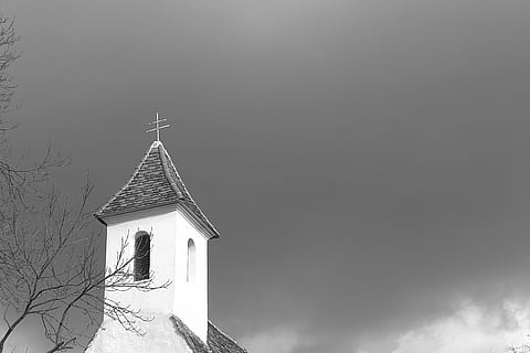 steeple, sky, clouds, cross, architecture, religion, belief, place of worship, tree, built structure, spirituality, building, building exterior, spire, tower, no people, nature, copy space, outdoors, extreme weather, snowing, 4K, CC0, public domain, royalty free