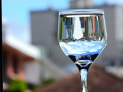 glass, focus, reflection, refraction, bowl, background, blurred, focus on foreground, refreshment, food and drink, drink, close-up, drinking glass, glass - material, alcohol, no people, household equipment, wine, outdoors, architecture, building exterior, day, single object, wineglass, luxury, 4K, CC0, public domain, royalty free