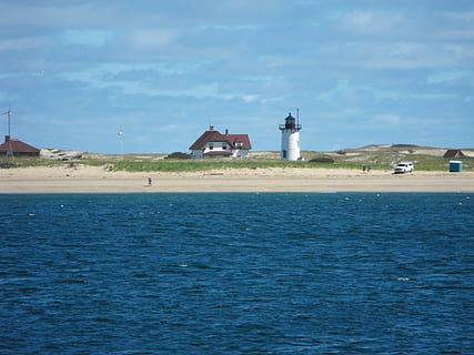 brown, house, white, lighthouse, front, ocean, cape cod, massachusetts, beach, coast, water, vacation, coastline, summer, atlantic, sand, shore, sea, built structure, architecture, building exterior, waterfront, sky, building, tower, cloud - sky, guidance, day, nature, blue, no people, scenics - nature, land, beauty in nature, outdoors, 2K, CC0, public domain, royalty free