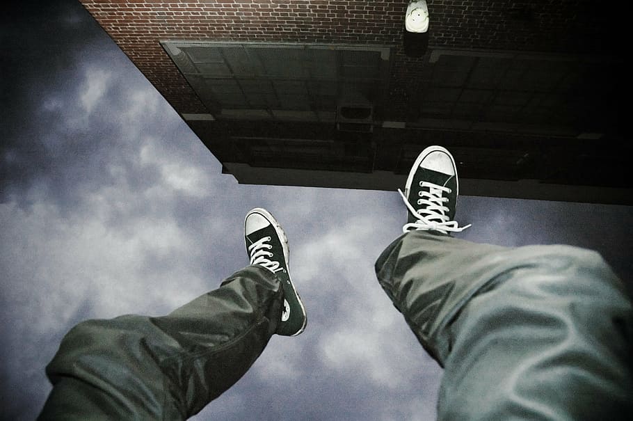 person, wearing, black-and-white, lace-up sneakers, falling, suicide, man, jump, upside down, danger, risk, fall, male, failure, crisis, fear, bankrupt, safety, flying, stress, accident, roof, sky, shoes, slip, gravity, anti-gravity, night, clouds, storm, shoe, low section, human leg, personal perspective, human body part, adult, activity, people, sport, canvas shoe, body part, men, human limb, leisure activity, cloud - sky, lifestyles, limb, outdoors, real people, relaxation, jeans, human foot, 2K