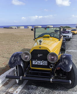 årgang, gul, bil, parkeret, legeme, vand, cuba, oldtimer, auto, klassisk, automotive, havana, transportmidler, transportform, himmel, land køretøj, sky - himmel, dag, natur, jord, Mark, motor køretøj, ingen mennesker, vej, udendørs, tekst, stationær, vestlige script, miljø, 4K, CC0, offentligt domæne, royaltyfrie