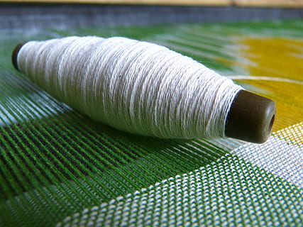 white, yard, green, texctile, silk, yarn, thread spool, thread, weave, fabric, textile, close-up, textile industry, sewing, material, wool, green color, spool, industry, art and craft, craft, group of objects, indoors, creativity, sewing item, cotton, selective focus, sewing needle, 4K, CC0, public domain, royalty free