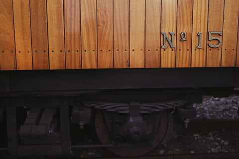 15, train, railroad Track, transportation, railroad Station Platform, station, locomotive, wood - material, no people, communication, indoors, metal, text, day, close-up, stack, number, architecture, large group of objects, cabinet, western script, rail transportation, belief, religion, furniture, old, 5K, CC0, public domain, royalty free