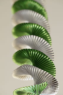 spiral, garland, pattern, structure, texture, celebration, festival, decorated, decoration, deco, carnival, birthday, leaf, plant part, green color, indoors, close-up, no people, plant, growth, studio shot, palm tree, palm leaf, nature, still life, frond, tree, tropical climate, natural pattern, leaves, houseplant, 5K, CC0, public domain, royalty free