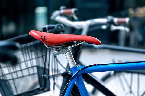 seat on bicycle, Seat, bicycle, various, bicycles, bike, bikes, transportation, wheel, cycle, mode of Transport, cycling, no People, street, close-up, outdoors, red, mode of transportation, land vehicle, handlebar, focus on foreground, stationary, handle, metal, day, parking, basket, city, travel, absence, chrome, silver colored, spoke, 4K, CC0, public domain, royalty free