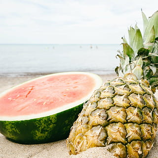 yellow, pineapple, sliced, watermelon, brown, sand, sunset, fruit, beach, golden, summer, tropical, tropical fruit, ocean, lake, people, swimming, food, freshness, ripe, slice, refreshment, healthy Eating, gourmet, dieting, food and drink, wellbeing, close-up, focus on foreground, water, sea, no people, still life, sky, day, green color, horizon over water, nature, 2K, CC0, public domain, royalty free