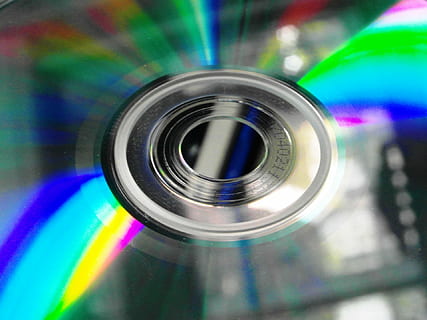bytes, cd rom, colorful, compact, copy, data, disc, dvd, empty, information, isolated, knowledge, media, music, playback, record, reflect, reflection, rainbow, spectrum, shiny, storage, technology, background, close-up, indoors, multi colored, still life, no people, circle, compact disc, geometric shape, shape, focus on foreground, photography themes, glass - material, selective focus, lens - optical instrument, metal, equipment, high angle view, single object, silver colored, 1080P, CC0, public domain, royalty free