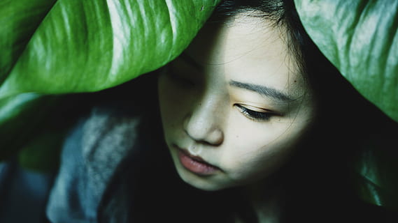 adult, alone, beautiful, blur, close-up, cute, eye, face, facial expression, fashion, girl, indoors, leaves, model, outdoors, people, person, photoshoot, portrait, pretty, sad, unhappy, woman, headshot, one person, young adult, leaf, young women, looking, black hair, sadness, contemplation, plant part, focus on foreground, body part, emotion, green color, human body part, hair, beautiful woman, human face, depression - sadness, teenager, hairstyle, teardrop, 5K