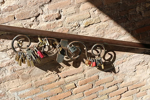 lock, key, hook, architecture, built structure, padlock, wall - building feature, day, wall, hanging, no people, love lock, protection, stone wall, railing, positive emotion, sunlight, safety, security, love, metal, emotion, brick, stone material, outdoors, 5K, CC0, public domain, royalty free