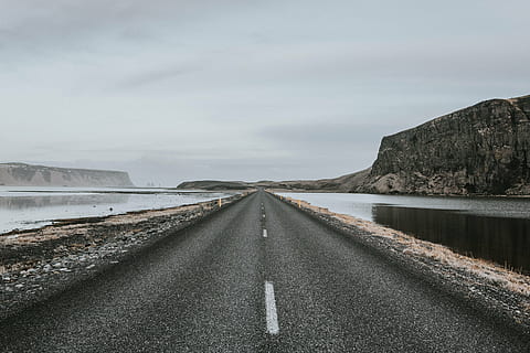 asphalt road, body, water, mountain, road, path, highland, landscape, sea, the way forward, diminishing perspective, transportation, no people, outdoors, day, sky, nature, direction, symbol, road marking, vanishing point, non-urban scene, environment, sign, marking, scenics - nature, cloud - sky, tranquility, dividing line, surface level, 5K, CC0, public domain, royalty free