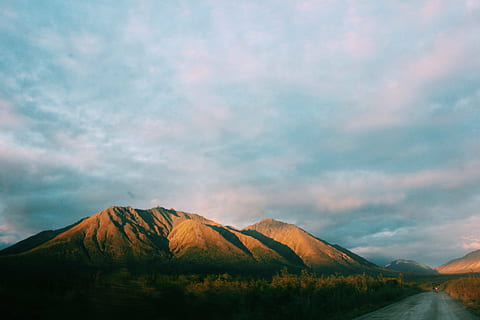 landscape photography, brown, mountains, mountain, daytime, sky, clouds, trees, plants, nature, road, street, sunset, scenics, beauty in nature, tranquility, tranquil scene, outdoors, no people, cloud - sky, scenics - nature, environment, landscape, non-urban scene, land, day, mountain range, remote, plant, morning, dawn, mountain peak, purity, semi-arid, 5K, CC0, public domain, royalty free