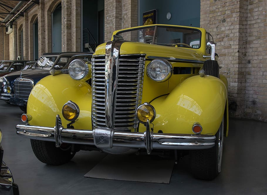 automàtic, buick, v8, oldtimer, clàssic, cabriolet, crom, EUA, graella, sistema de transport, vehicle, conduir, manera de transport, vehicle terrestre, estil retro, transport, groc, cotxe d'època, estacionari, arquitectura, cotxe, estructura construïda, automòbil, dia, ciutat, exterior de l'edifici, cap gent, faro, carrer, viatjar, metall, vintage, 4K