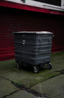 gray, wheeled, trash bin, gray garbage container, trashbin, bin, trash, continental, wall, built structure, day, architecture, building exterior, no people, transportation, red, mode of transportation, wall - building feature, land vehicle, outdoors, city, shutter, metal, street, stationary, brick, brick wall, wheel, footpath, garage, 5K, CC0, public domain, royalty free