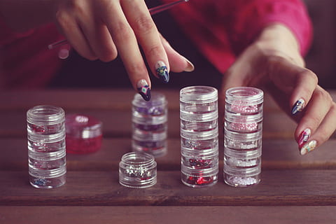 person, touching, glass tubes, human Hand, women, close-up, people, holding, human body part, one person, indoors, in a row, focus on foreground, hand, table, midsection, human finger, finger, coin, body part, real people, stack, lifestyles, finance, nail polish, glass, nail, nail art, 1080P, CC0, public domain, royalty free