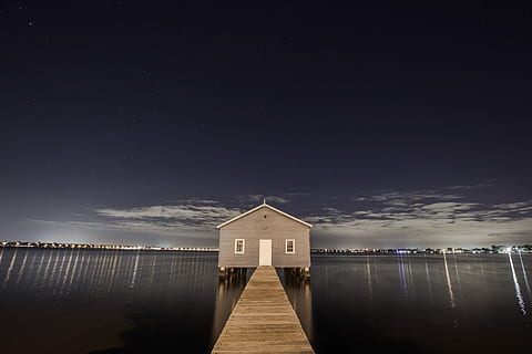 gray, wooden, house, beside, dock, body, water, in between, body of water, nature, lake, sky, dam, outdoors, landscape, river, pier, sea, reflection, blue, no people, day, architecture, built structure, night, building exterior, star - space, illuminated, scenics - nature, tranquility, copy space, building, beauty in nature, cloud - sky, astronomy, 4K